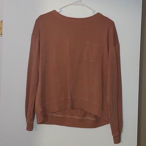 Brand unknown. peach sweater